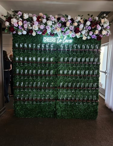 champagne walll burgundy themed floral arrangement