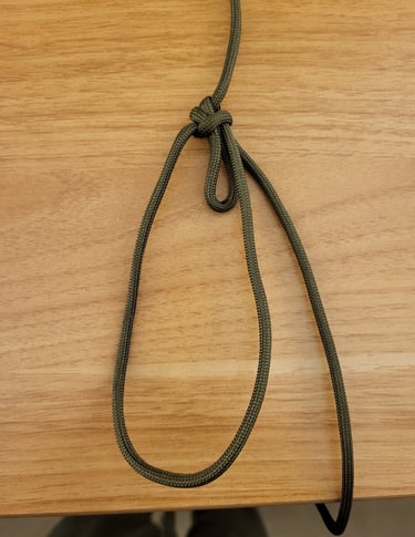 Bowline with a bight in green paracord