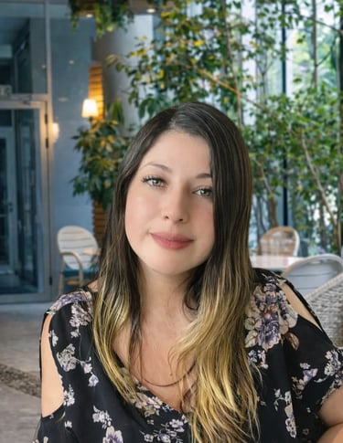 a woman sitting on a couch in a room
