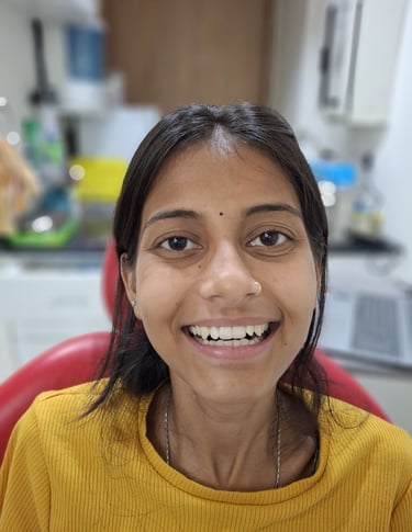  Smiling patient after successful dental treatment at Shree Dental Care in Shyamal, Ahmedabad