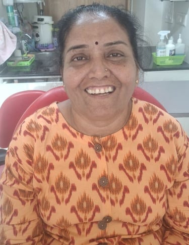 happy and healthy patient after lower full teeth replacement at shree dental care near shyamal