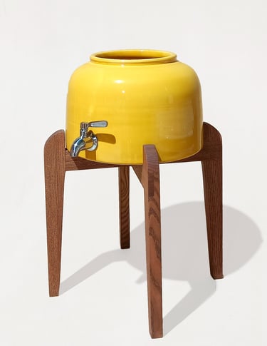 Elegant ceramic water dispenser compatible with 5-gallon US containers, standing out as a high-quality alternative.