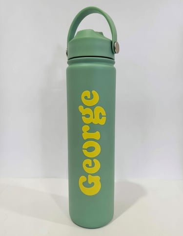 a green water bottle with a green and yellow name on it
