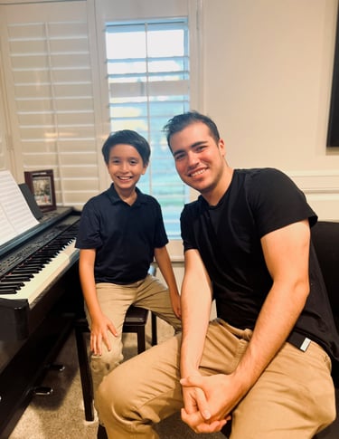Daine Jordan with 8 year old piano student Matteo