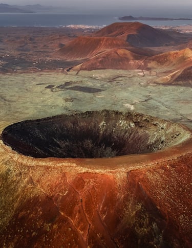 a large crater with a large crater in the middle