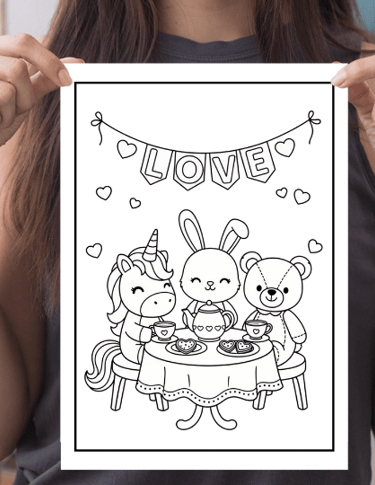 a woman holding a card with a drawing of a cartoon character