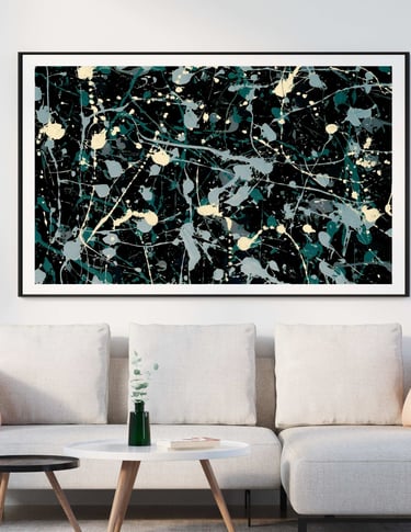 a couch with an splatter abstract painting of a black and white paint