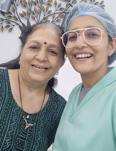 Top cosmetic dentist with happy patient after teeth gap closure with teeth veneers in Goregaon west Mumbai