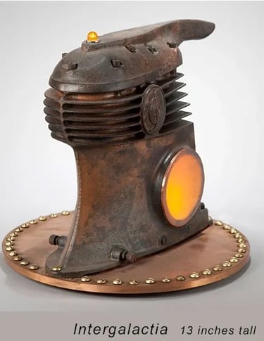 Found object lighted sculpture named Intergalactia by artist Tal Avitzur.