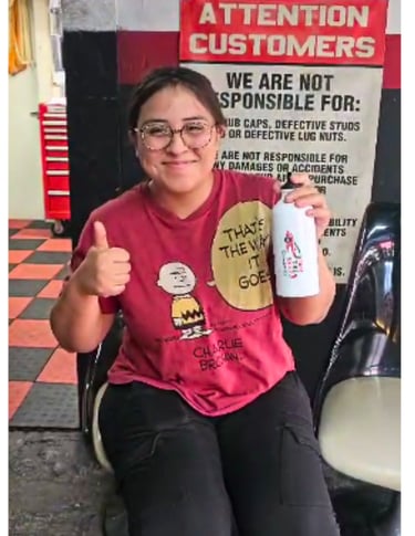 Satisfied customer showing appreciation for Fast Tire Shop’s friendly and professional service in Ea