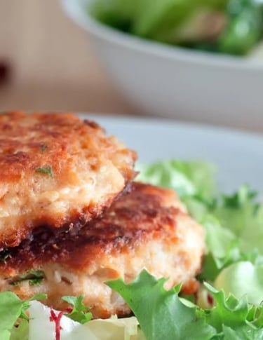 salmon prepper patty on a bed of lettuce thm s recipe