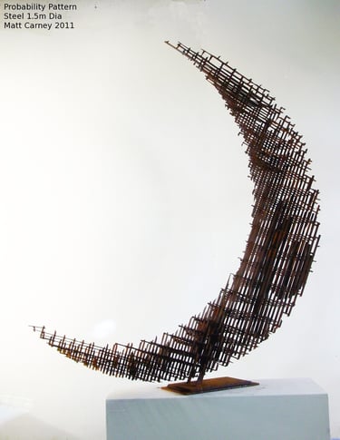 a steel cross-hatched crescent shaped sculpture