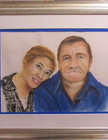 Portrait of a loving engaged couple commissioned by him as Christmas present for his fiancée. Portrait drawn in soft pastel.