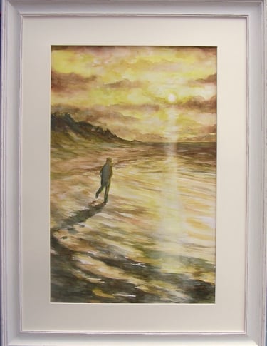 Lone figure, lost in thought, walks across Southport sands with setting sun reflected in the waves