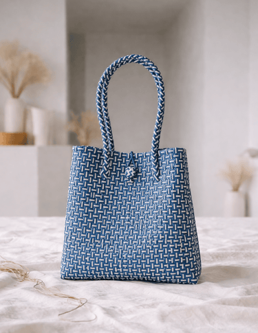 Handwoven blue striped plastic tote bag handmade from recycled materials by Indonesian artisans