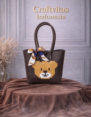 Brown handwoven plastic tote bag with bear character design, handmade sustainable tote bag