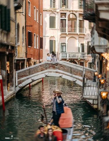 Couple on bridge over Venice canal