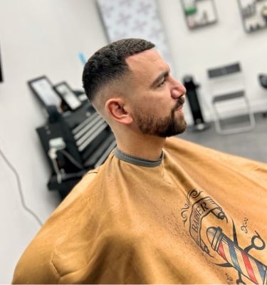 Man with skin fade and beard trim at Yau Barber Studio in Orsett, Essex