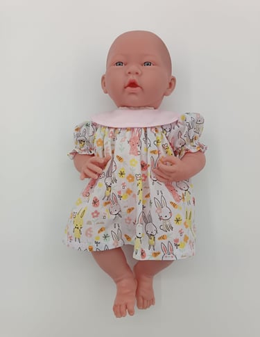 Berenguer doll in handade dress