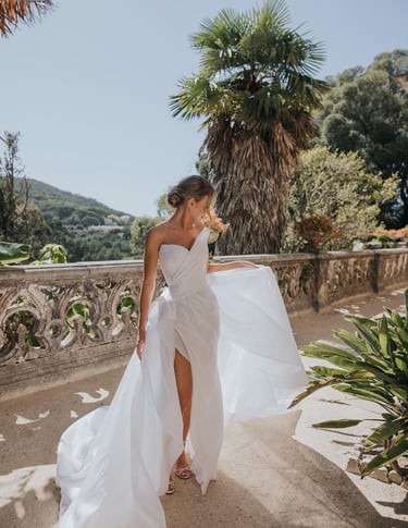 Beautiful fashionable bride wearing low bun on her wedding photoshoot
