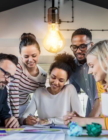 a group of people sitting around a table