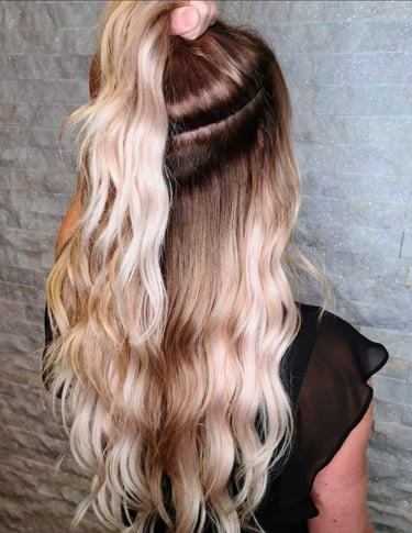 Invisible Bead Extensions installed by Calgary hair extension specialist Kathy Page