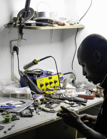 Technician Repairing iphone