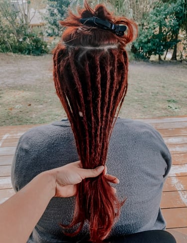 a woman with dreadlocks