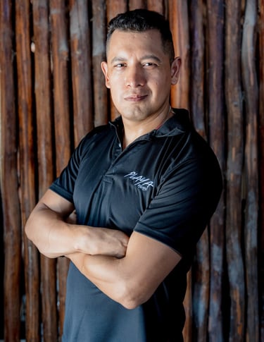 Alex Torres wearing a Playa Films t-shirt, representing the video production brand in Playa del Carm