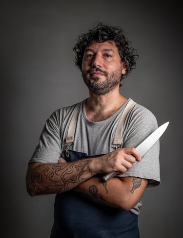 portrait of a chef with a knife in his hand in Jaco costa rica