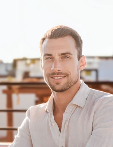 A professional headshot of Matt Jensen, the founder of ExcelKits, smiling in a white buttoned shirt 