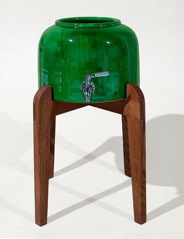 Elegant ceramic water dispenser with handcrafted wooden stand, highlighting the love and care in every detail