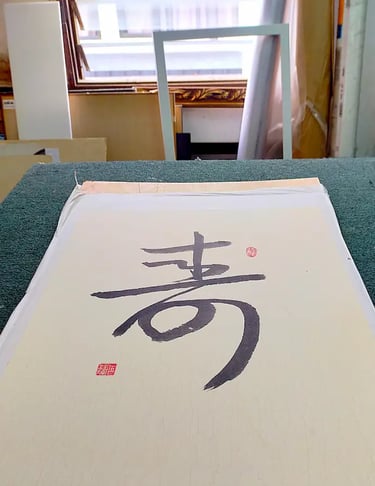 Mounting of Chinese Calligraphy in our Kuala Lumpur framing studio