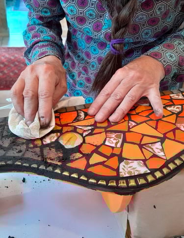 a woman is using a piece of art