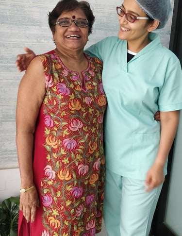 Happy dental patient after painless Dental Implants at top dental clinic near orlem malad west in mumbai