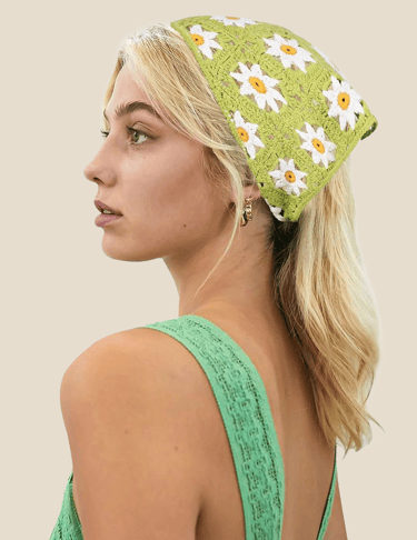 a woman with a green head scarf with flowers