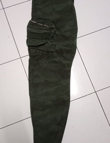 a pair of pants with a tag on the bottom of the pants