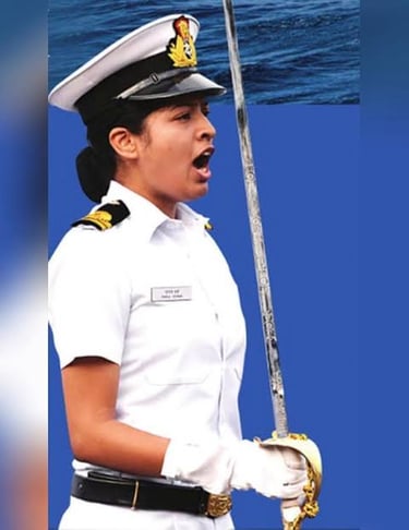 A woman Navy Officer in uniform confidently holds a sword, exuding strength and determination.
