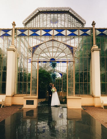 Bride and groom portrait outside the Adelaide Botanic Garden glasshouse