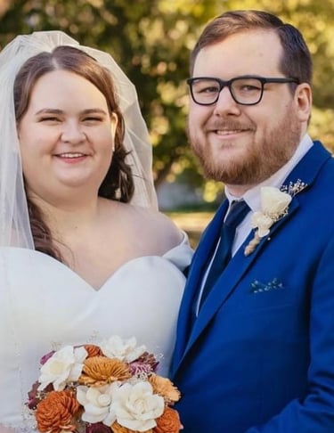bride and groom with her bouquet