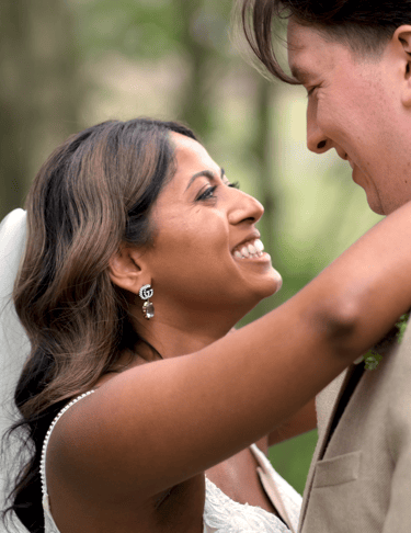 A bride and groom embracing