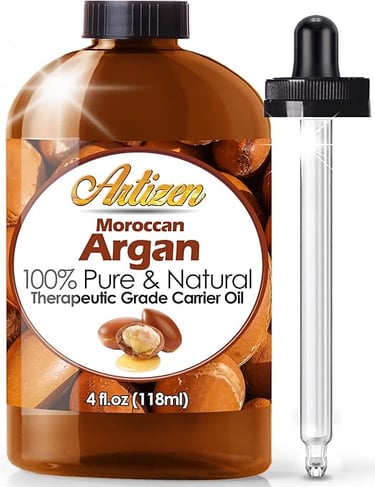 a bottle of argan oil with a glass bottle of argan oil