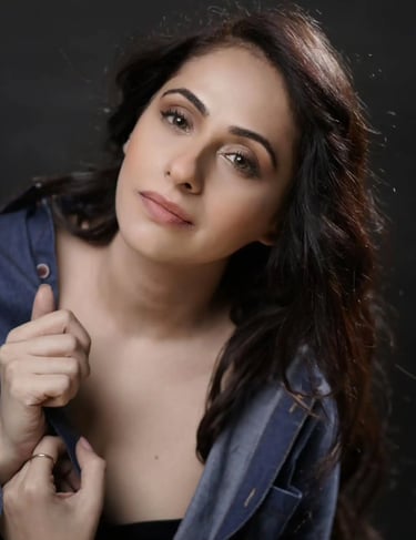 a woman in a denim jacket and jeans jacket