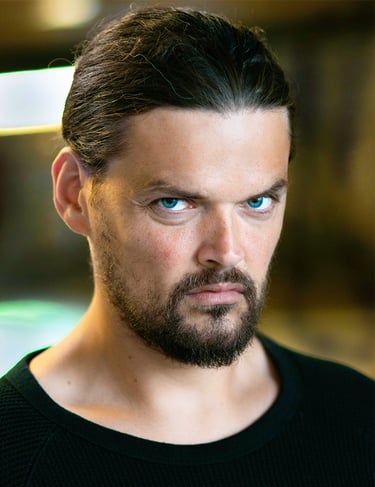 a man with a beard and a beard