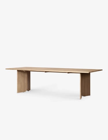 Minimal wooden outdoor table with simple design, suitable for a calm garden corner or patio seating 