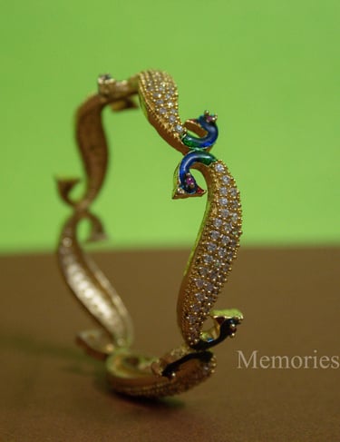 a bracelet bracelet with a bracelet with a blue and green flower