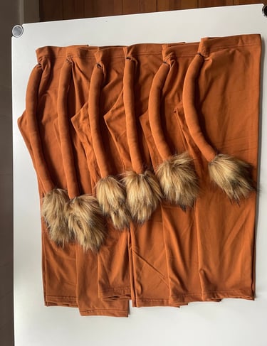 Handmade lion costume leggings with attached tails and faux fur tips