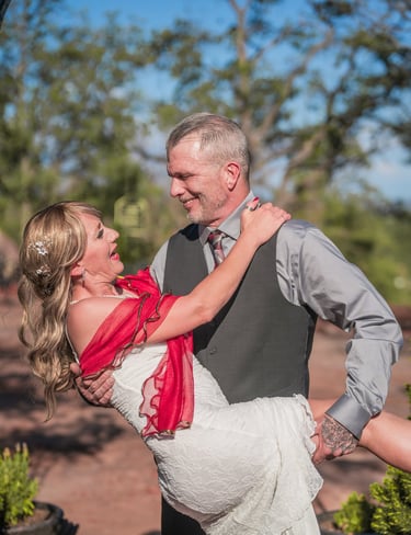a man and woman are holding each other
