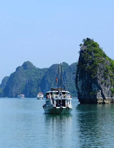 a boat in the water with a boat in the background