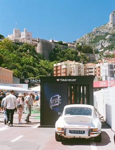 a race car parked in the paddock in Monaco